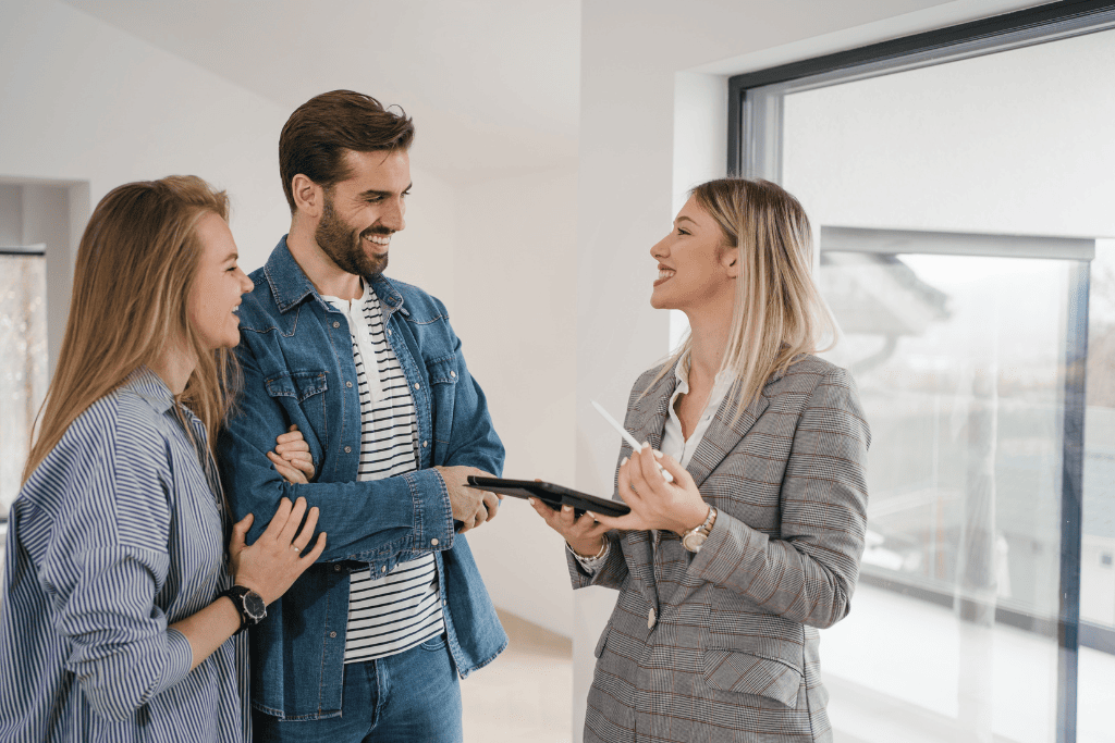Real estate agent with clients